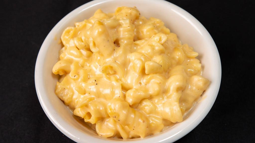 Mac N Cheese · Rotini pasta with sharp cheddar and smoked gouda cream sauce. (1 cup)
Vegetarian | Contains: dairy, wheat