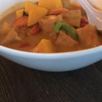 Pumpkin Curry · Choice of meat in our signature red curry, coconut milk, fresh pumpkin, basil, carrots, and ...