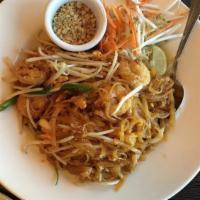 Pad Thai · Stir-fried rice noodles, egg, tamarind juice, bean sprouts, green onions, and crushed peanut...