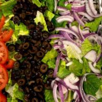 Garden Salad · Includes romaine, lettuce, tomato, black olives and onion.