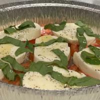 Caprese Salad · roma tomatoe Fresh mozzarella, virgin olive oil, basil, salt and pepper.