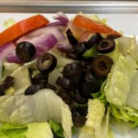 Side Salad · Includes romaine, lettuce, tomato, black olives and onion.
