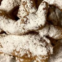 Fried Dough · With butter, cinnamon and powdered sugar.