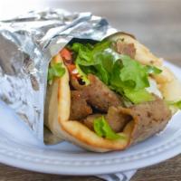Gyro Plate · Gyro slices served with pita bread, onions, tomatoes and tzatziki sauce served with french f...