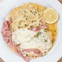 Chicken Sorrento · Boneless chicken breast with prosciutto julienne and mozarella cheese melted in wine lemon s...