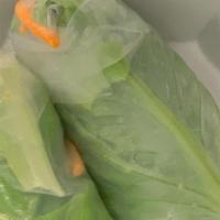 Fresh Spring Rolls · Two rice paper wrapped vegetable rolls. Served with our house sweet and sour with peanuts.