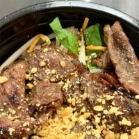 Vietnamese Noodle Salad · Rice noodles topped with your choice of grilled beef, chicken, pork, or tofu shredded carrot...
