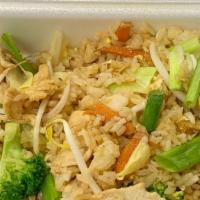 House Style Fried Rice · Seasoned rice stir fried with mixed vegetables and beef, chicken, or pork.