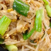 Phad Thai · Stir fried rice noodles with egg, bean sprouts, crushed peanuts, and green onions in our hou...