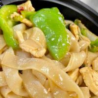 Drunken Noodles · Stir fried wide rice noodles with Thai basil, onions, bell peppers and Thai chilies.