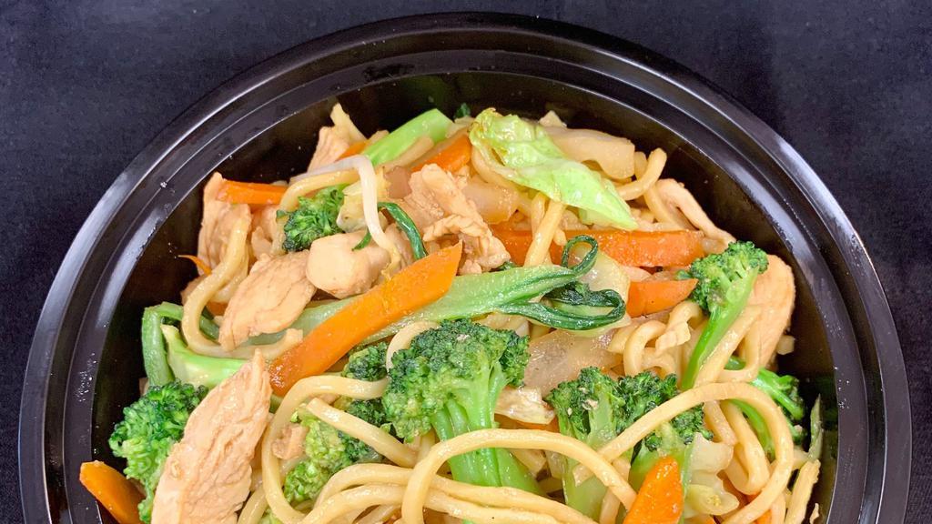 Lo Mein · Stir fried egg noodles with baby bok choy, onions, carrots, broccoli and cabbage in a light gravy.