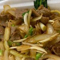 Chow Funn · Stir fried wide rice noodles with onions, green onions, bean sprouts, and baby bok choy.