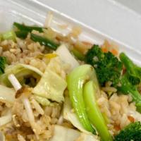Vegetarian Fried Rice · Stir fried seasoned rice with mixed vegetables and egg.