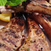 Lamb Chops · Tender lamb chops marinated overnight in spiced yogurt and cooked on a skewer