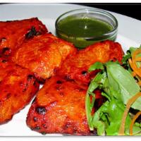 Salmon Tikka · Salmon marinated in mint, garlic and cooked on a skewer