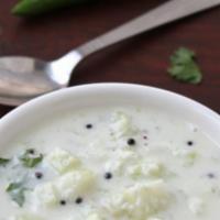 Raita Small · Yogurt dip with finely chopped cucumbers and tomatoes
