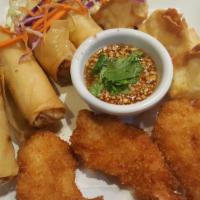 Aroma Thai Sampler · Hot. Combination of fried spring rolls, crab angle and co-co shrimp served with special hous...