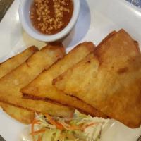 Chicken Lover (4) · Hot. Marinated ground chicken breast, sandwiched between thin rice paper crepes, then fried ...