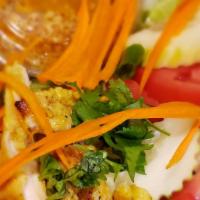 Grilled Satay Salad · Grilled chicken, garden fresh green salad with peanut dressing.