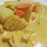 Yellow Curry · Coconut milk, potato, onion, peas and carrot.