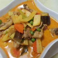 Roasted Duck Curry · Hot. Boneless chunks of roasted duck meat and sweet pineapple, simmered with coconut milk in...