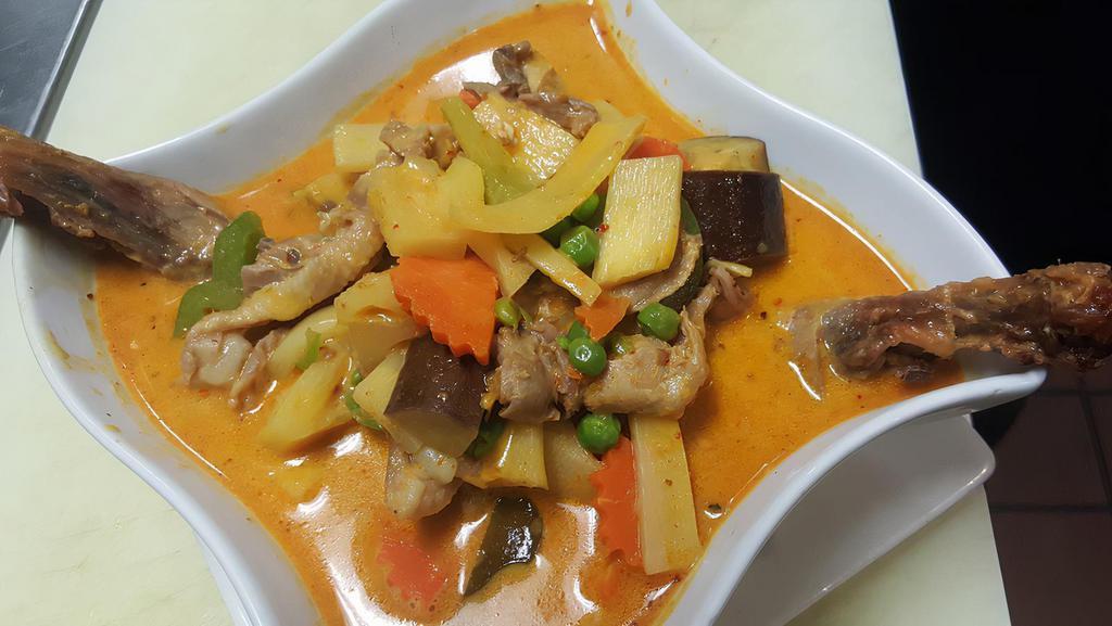 Roasted Duck Curry · Hot. Boneless chunks of roasted duck meat and sweet pineapple, simmered with coconut milk in red curry sauce. Treat yourself to the very best.