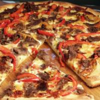 Philly Cheese Steak · Slices of steak, fresh onions, fresh peppers, fresh mushrooms, premium mozzarella and our si...