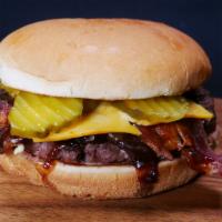 Double Bacon Beef · Beef, Cheddar Americano cheese, bacon, pickles, BBQ sauce, toasted bun.