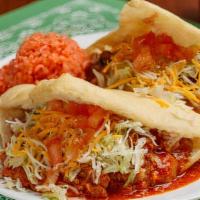 Stuffed Sopapillas · Two sopapillas stuffed with refried beans and your choice of red or green Chile con carne, l...