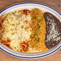Enchilada Shredded Beef · Red chili sauce, blended cheeses.. Served With Rice, Refried Beans, Sour Cream, Guac and Pic...