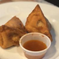 Samosa (2 Pc) · Hand rolled pastry stuffed with potato and green peas.