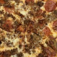 Meat Pizza · Pepperoni, sausage, ham, bacon and ground beef.