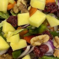 Mango Salad · Mixed greens, roasted bell peppers, carrots, almonds, red onions, sliced mangos and poppy se...