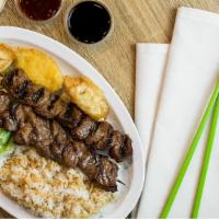 #4. Beef Kabobs Plate · 2 Grilled Sirloin Beef Kabobs over Rice with Salad and Side Tempura