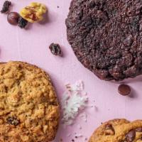 Almond Butter Cookies Dipped In Milk Chocolate · Bag of five almond butter cookies dipped in belgium milk chocolate and sprinkled with hazeln...
