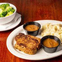 Mama’S Meatloaf · A timeless classic, house-made and sitting on a mound of smashed potatoes and steamed vegeta...
