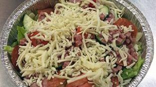 Antipasto Salad · Served with a roll, lettuce, tomatoes, cucumber, ham, pepperoni, salami, and mozzarella chee...