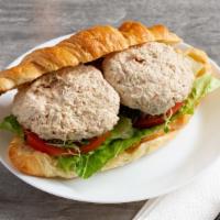Tuna Salad Sandwich · House made Tuna salad with Lettuce, Onion, Tomatoes, Spinach on your choice of bagel/croissa...