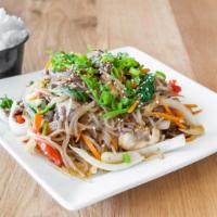 Japchae · Glass noodles sautéed with marinated ribeye and vegetables.