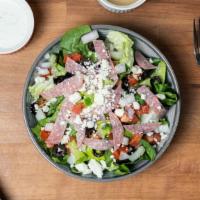 House Salad · Romaine lettuce, feta, tomatoes, green peppers, onions, salami, olives and choice of dressing.