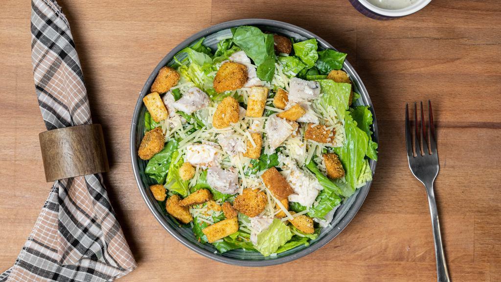 Chicken Caesar Salad · Romaine lettuce, grilled chicken, parmesan cheese, croutons, and classic Caesar dressing.