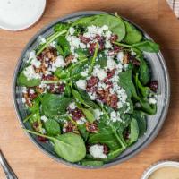 Spinach Salad · Spinach, dried cranberries, chopped pecans, feta cheese, choice of dressing.