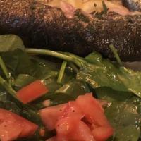 Pan-Roasted Trout With Rosemary & Lemon · Served with baby spinach & tomato salad.