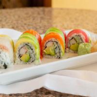 Rainbow Roll · Crab meat, avocado and cucumber wrapped with seaweed paper. Topped with salmon, tuna and avo...