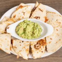 Botana Quesadilla · (8pcs) flour tortilla filled w/monterrey jack cheese, lightly grilled and served w/ guacamol...