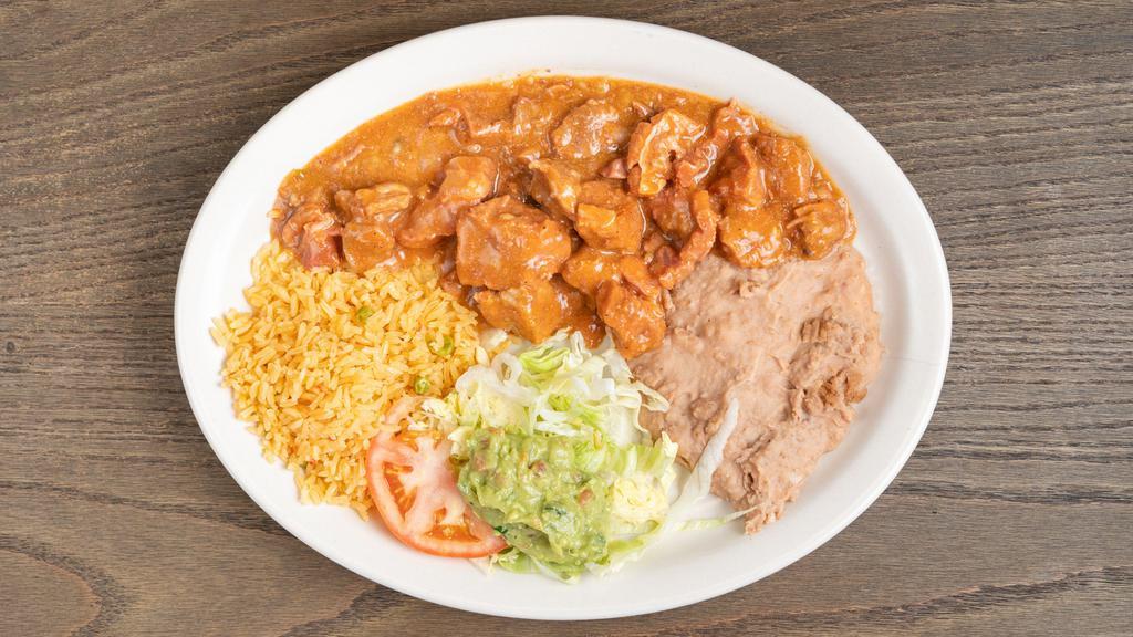 Carne Guisada Plate · Served w/Rice, beans & salad.