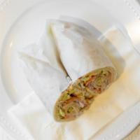 Gyro Sandwich · With tomato, onion, and tzatziki sauce on pita bread.