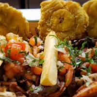 Picada Northena · Combo of skirt steak ,chicken ,chorizo ,shrimp ,tostones
,yuca and pico