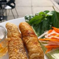 Shrimp & Crabmeat Spring Roll · Two pieces. Thin rice paper wrapped around a mixture of shrimp, crabmeat, onion and jicama t...