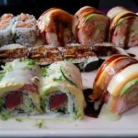 Sushi (Deluxe) · 10 pcs of fresh Assorted Sliced Raw Fish on Seasonal Sushi Rice & 1 Tuna Roll.

Consuming ra...
